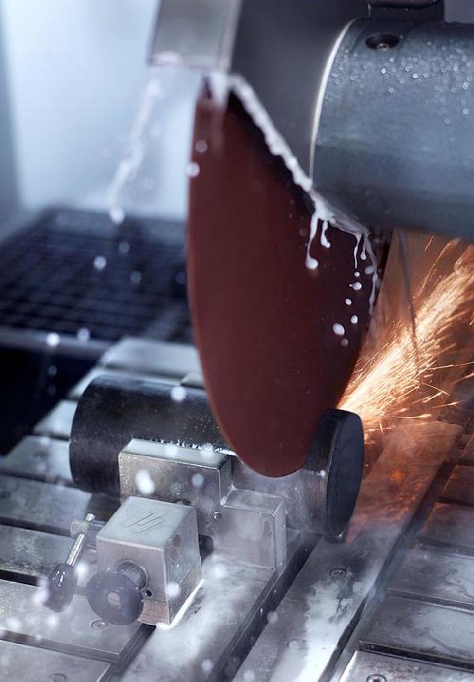 Clamp below front part of wheel